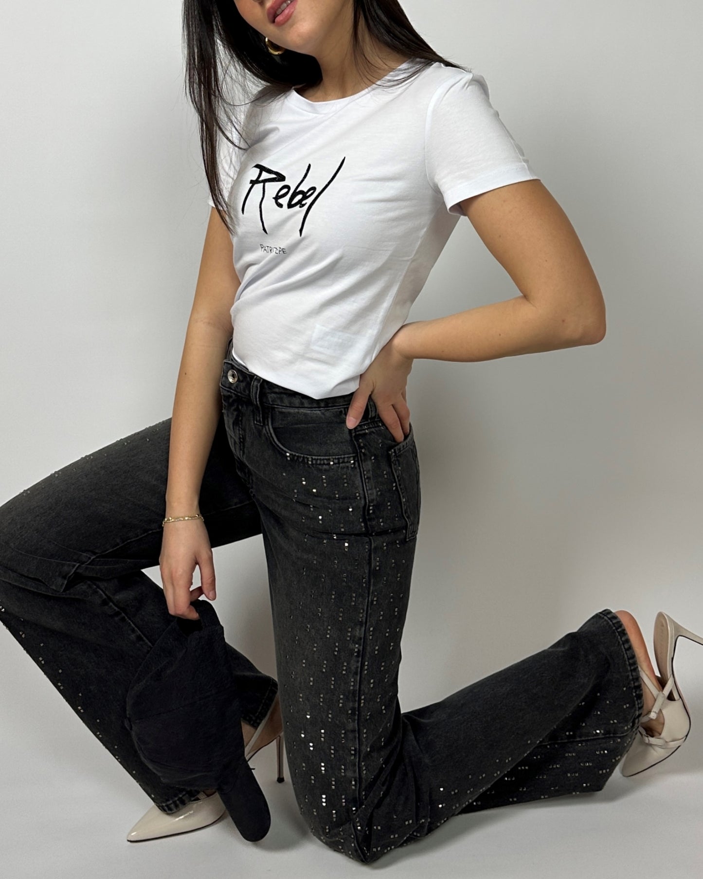 Jeans con borchie nero