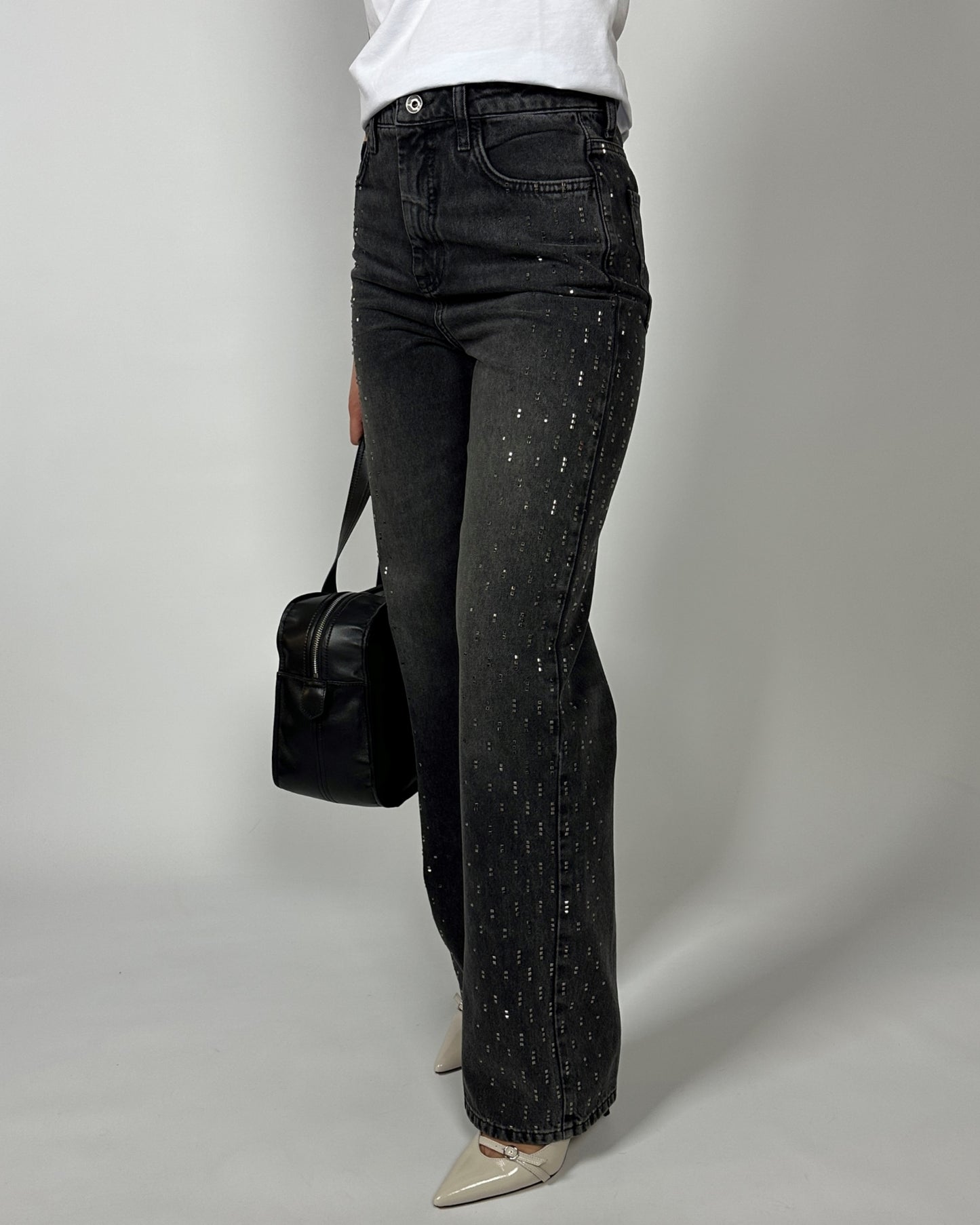 Jeans con borchie nero